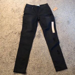 Mudd black skinny jeans with unhemmed legs
